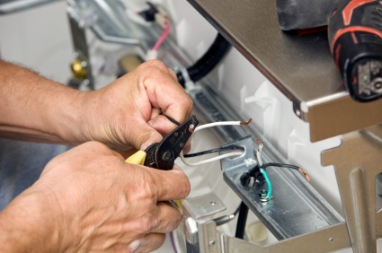 Elite Electrical Services repairing electric wires in Tulare, CA.
